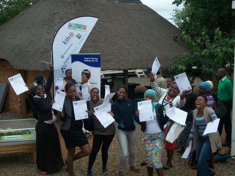 Abet Learners receiving certificates