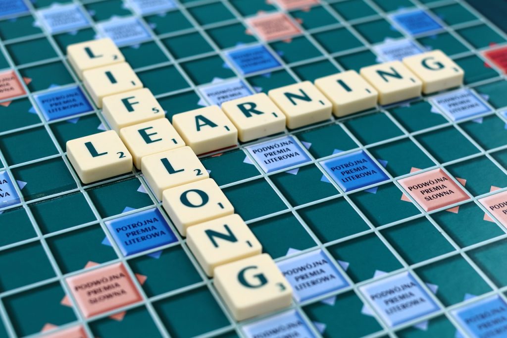 triple-e-training-abet-has-evolved-with-literacy-scrabble-board-with-words