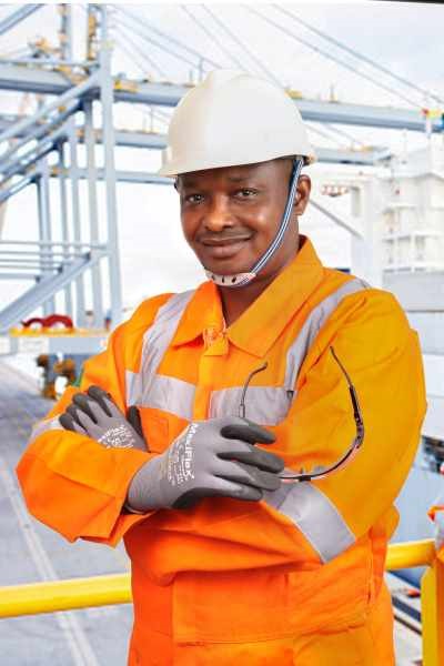 triple-e-training-compulsory-flc-for-occupational-training-man-in-safety-wear-with-arms-crossed