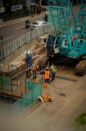 Work-based ABET training Construction team setting up scaffolding