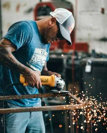 GETC: AET/ABET NQF 1 worker grinding metal