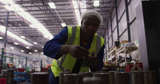 GETC AET workplaces become classrooms worker in factory